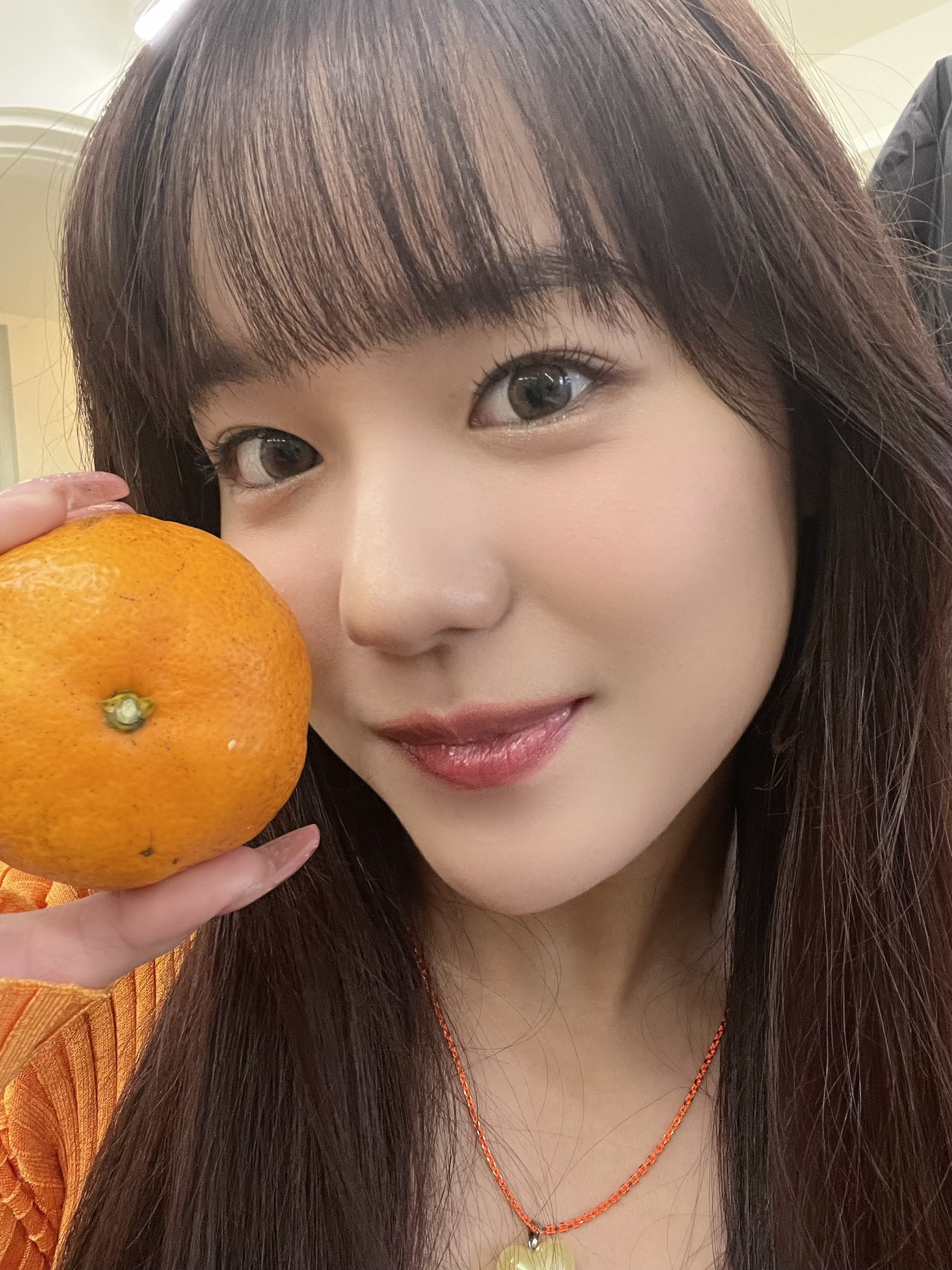 JURIA and her orange