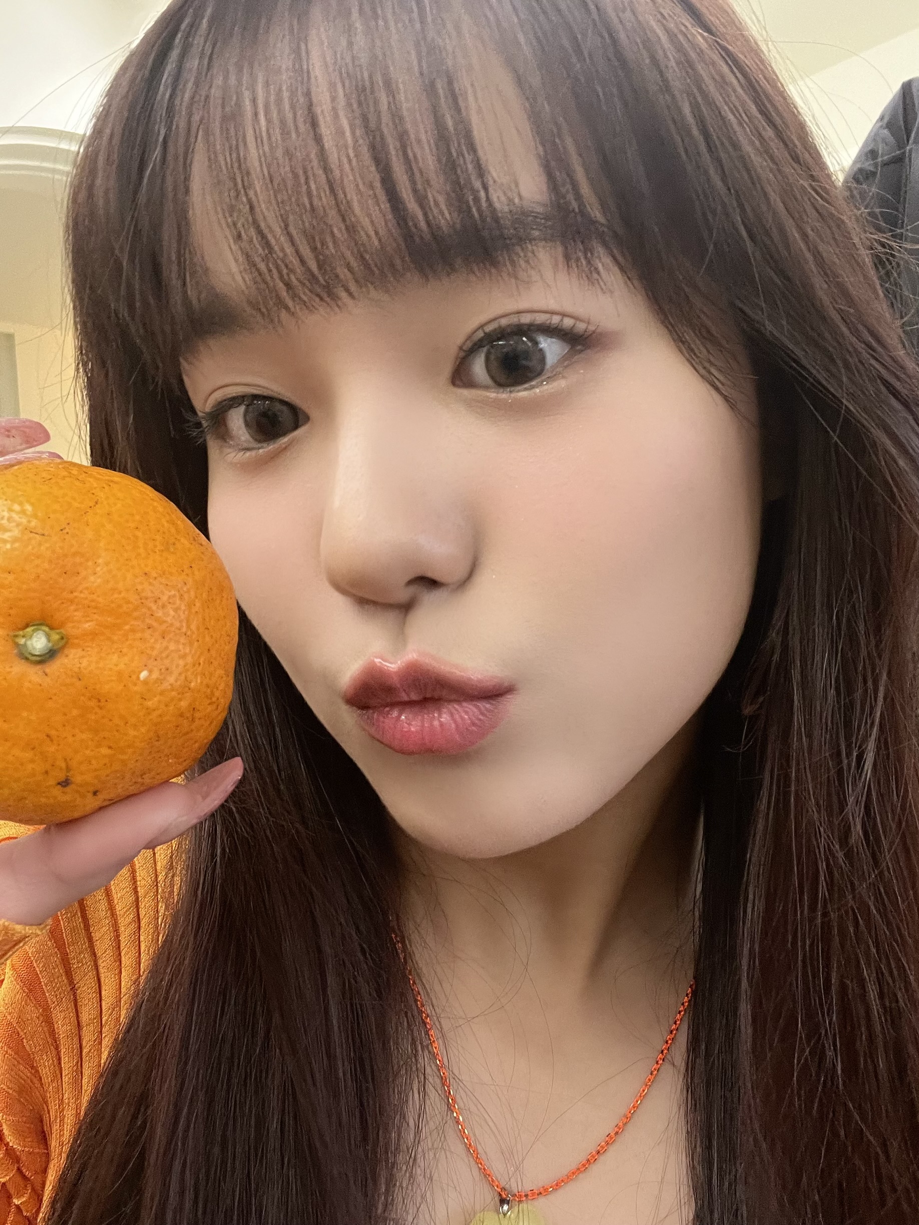 JURIA and her orange